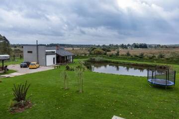Фото номера Дом с 2 спальнями Дома для отпуска Holiday House Koceri г. Кекава 49